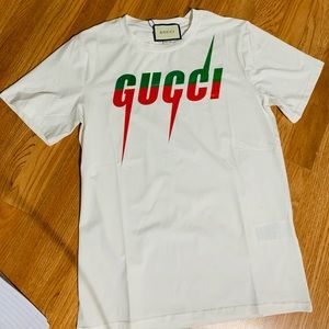 Gucci shirt(please note small hole)hold